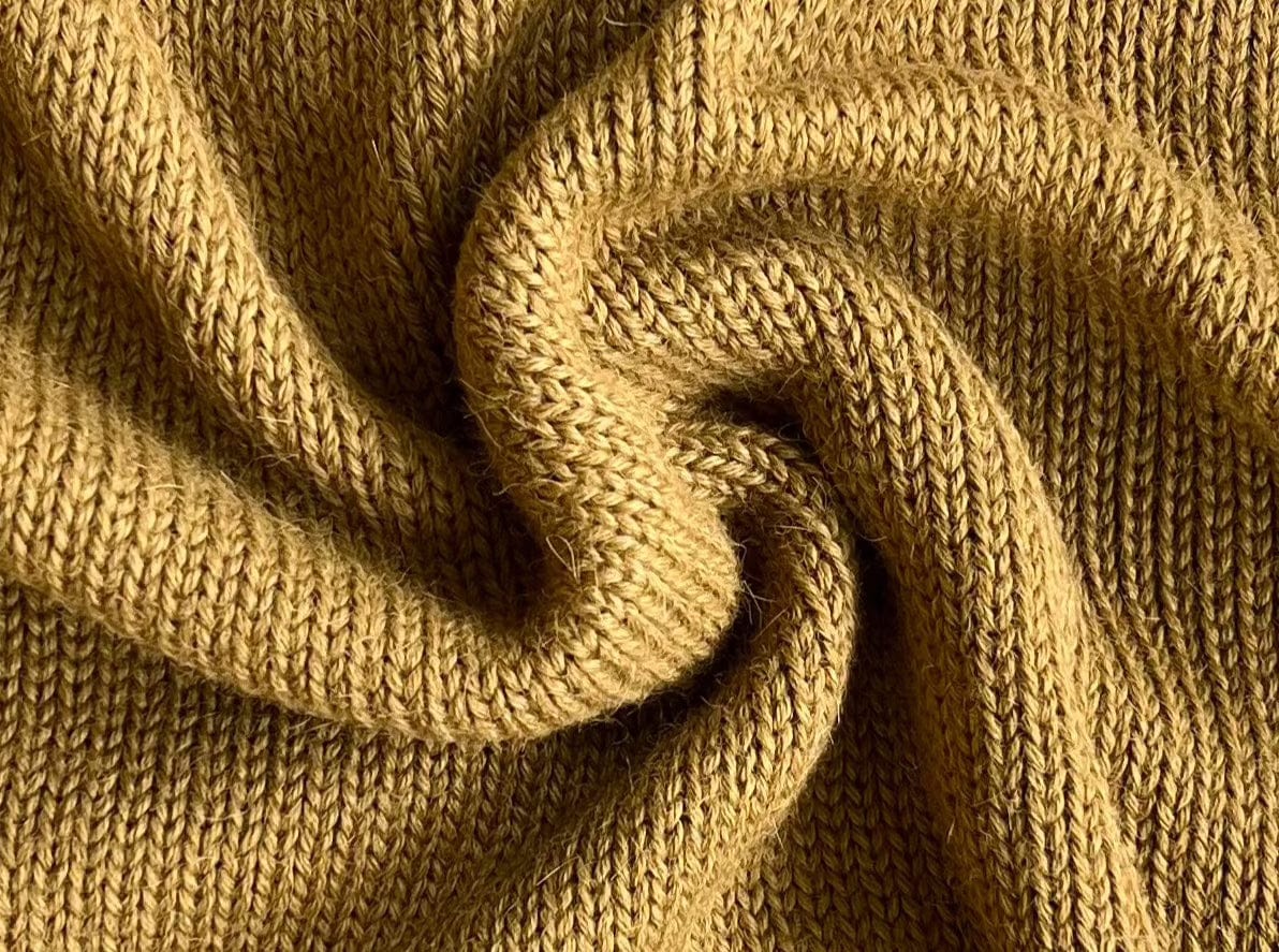 A cozy close up of the Billy Sweater - Yucca Green.