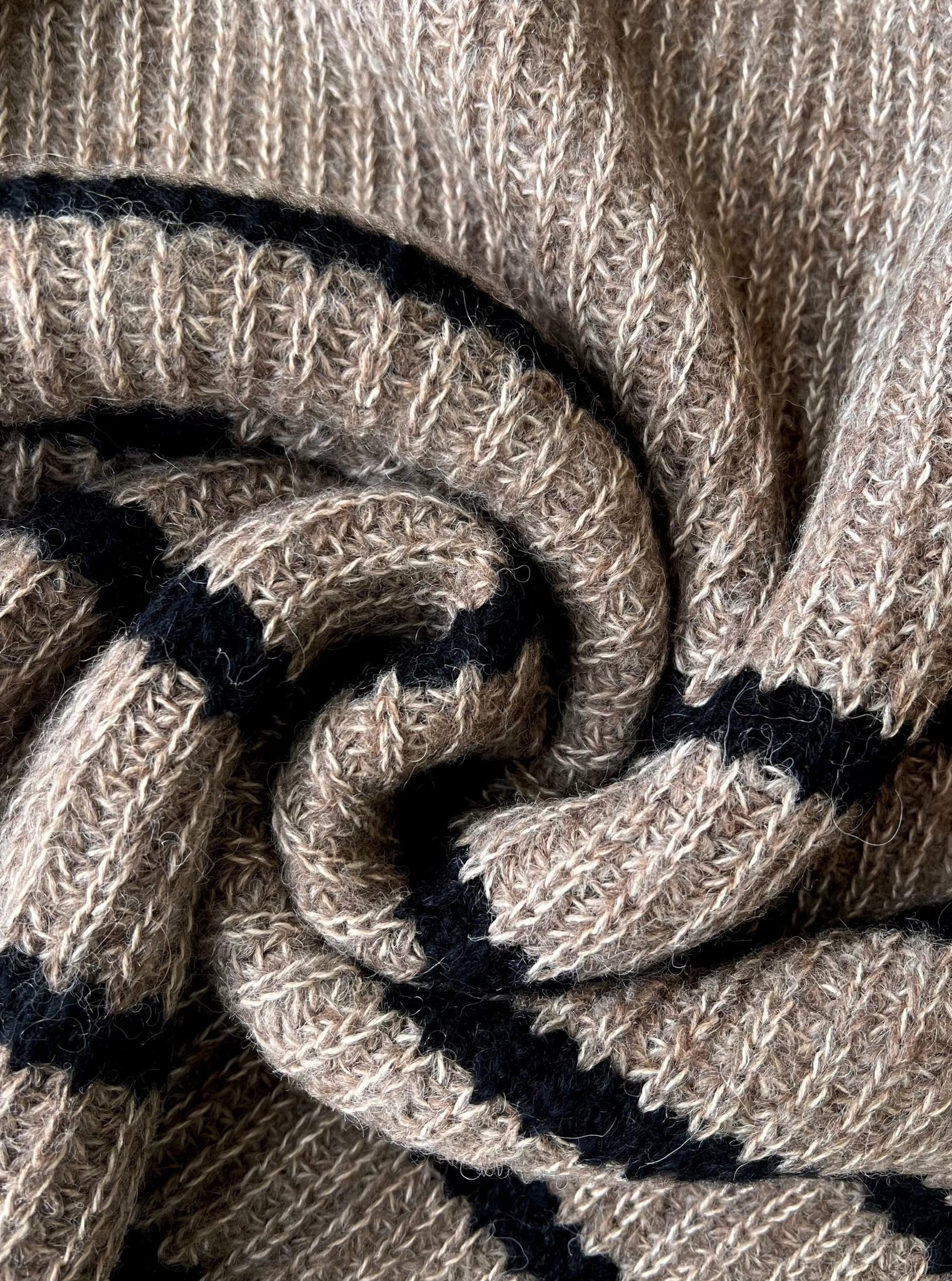 A cozy knit of a beige and black striped Field Sweater - Brown Stripe.