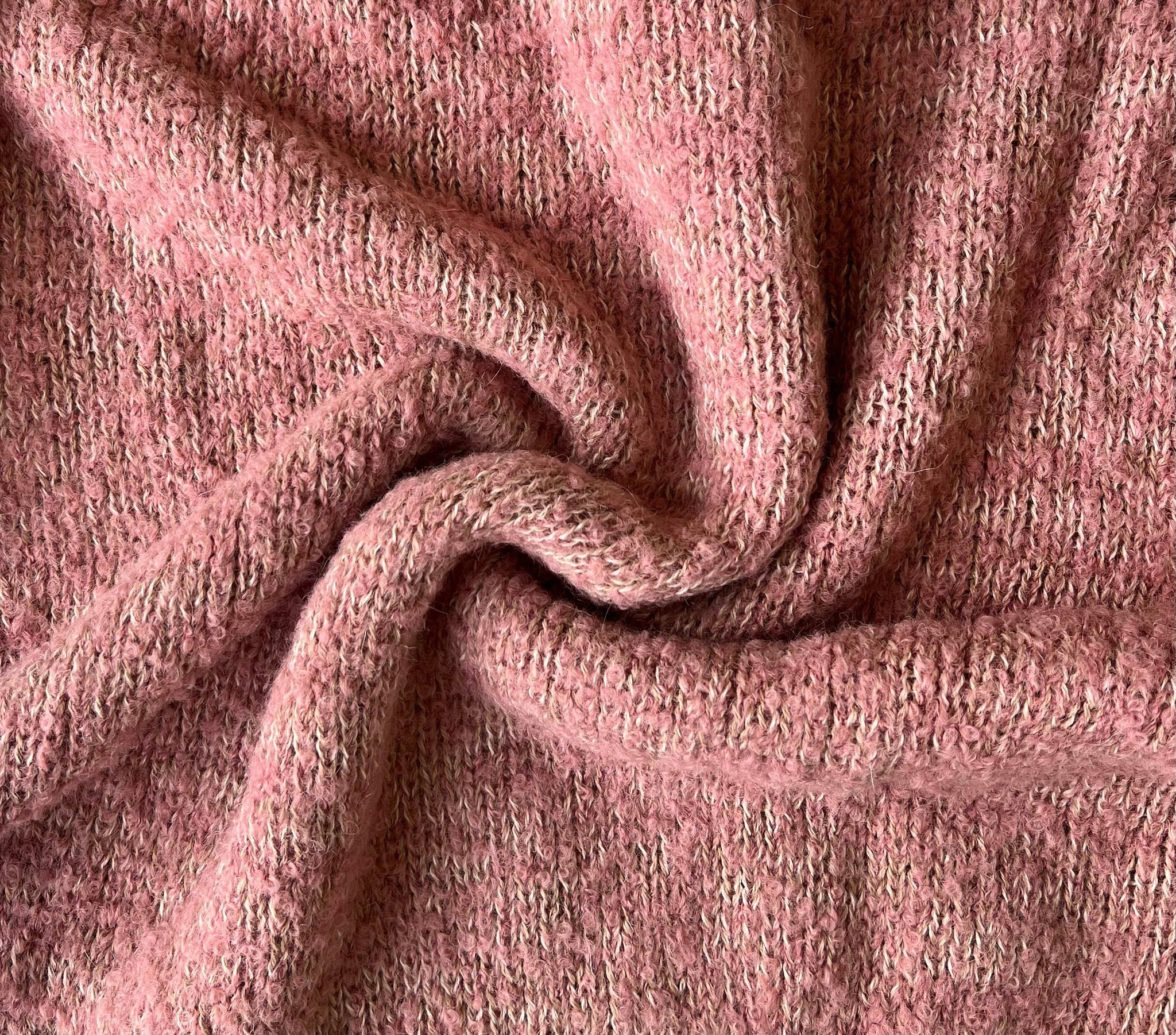 A close up of the Claudia Sweater - Pincushion Pink.