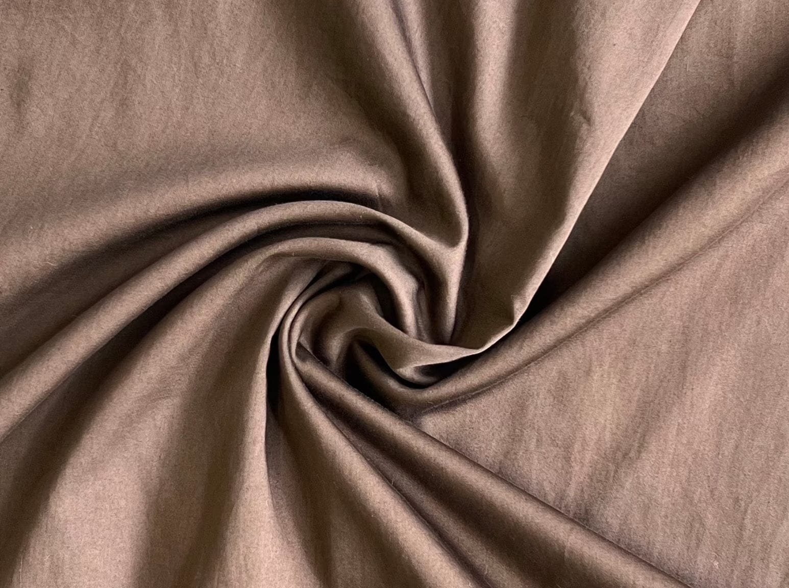 A sustainably made close up of the Kate Dress - Basalt Brown, handmade in India.