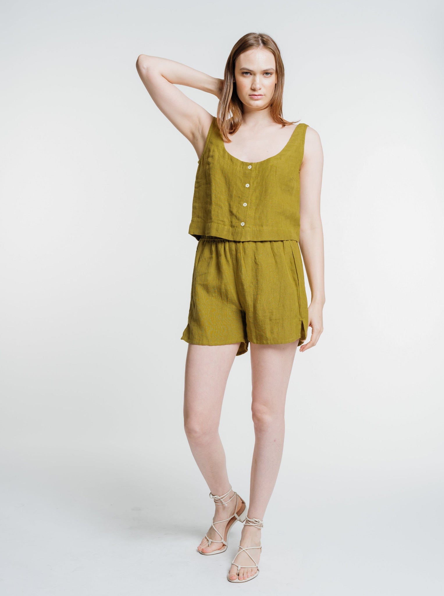 The model is wearing Everyday Short - Dried Tobacco.